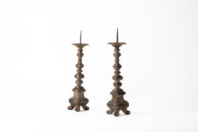 pair of antique cast iron candlesticks