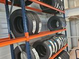 many tires on the shelves in the warehouse