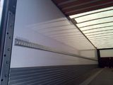 an image of the inside of a truck with the door open