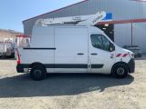 a picture of a white truck parked in front of a building