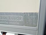 a close up of a sign on the side of a truck