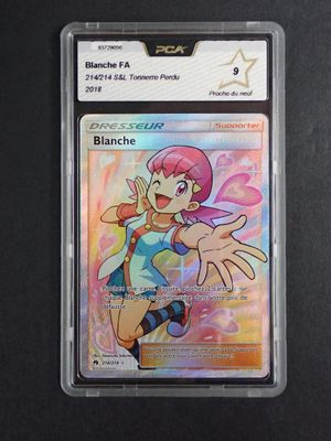 a close up of a card in a plastic holder on a table