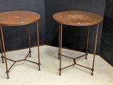 pair of round side tables with metal legs and a wooden top
