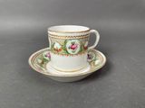 an image of a cup and saucer sitting on top of a table