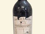 a bottle of wine that is sitting on a table