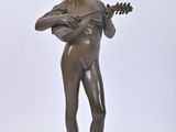 bronze statue of a woman playing a guitar on a white background