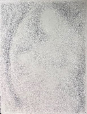 une image représentant le dessin du visage d'une personne sur une feuille de papier