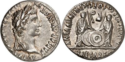 a silver coin with an image of a woman on it
