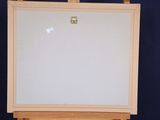 a picture of an easel with a white board on it