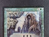 a picture of a card with a picture of a giant creature on it