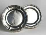 pair of silverplated plates with scalloped rims