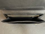 the inside of a black leather wallet with a zipper