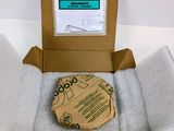 a cardboard box with a piece of paper inside of it