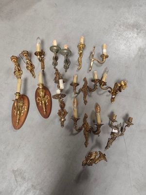 a lot of candles that are sitting on the floor