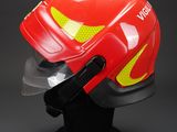 helmet with vise and goggles on display on black background