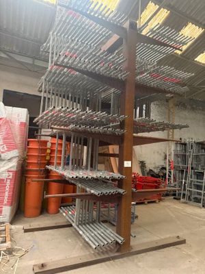 a picture of a rack of pipes in a warehouse