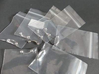 a bunch of plastic bags that are sitting on a table