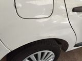 a white car that is parked in a garage