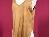 an image of a dress on a mannequin stand against a pink background