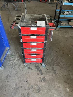 an image of a red tool cart in a garage