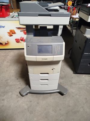 a printer that is sitting on top of a stand