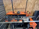 a machine that is sitting on a table in a garage