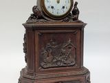 a clock that is sitting on top of a table