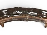 a wooden bridge that has birds on it