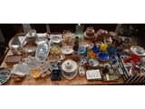 a table with a lot of dishes and cups on it