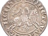 a close up of a coin on a white background