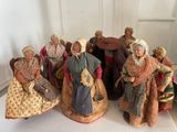 many figurines that are sitting on a table
