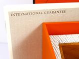 a picture of an orange box with a picture inside of it