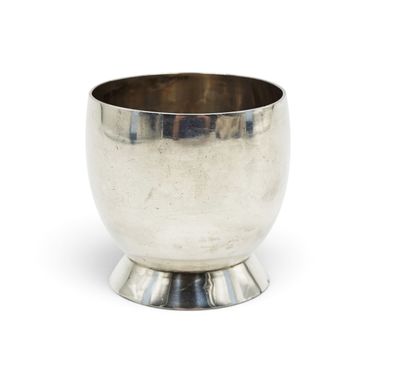 a silver cup on a stand on a white background