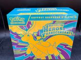 a box of pokemon trading cards with a yellow pokemon figure on it