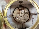a close up view of a clock with a clock face