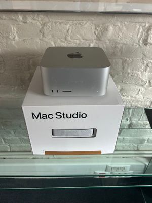 a box that has a computer on top of it