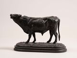 statue of a bull on a pedestal on a white background