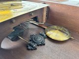 a table with a clock and other items on it