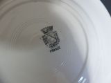 a white plate with a black and white design on it