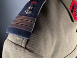 a close up of a uniform on a mannequin