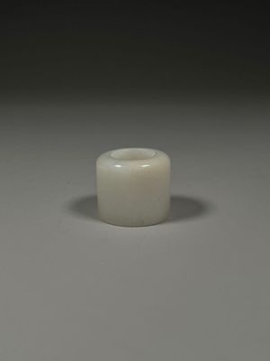 an image of a white vase sitting on top of a table