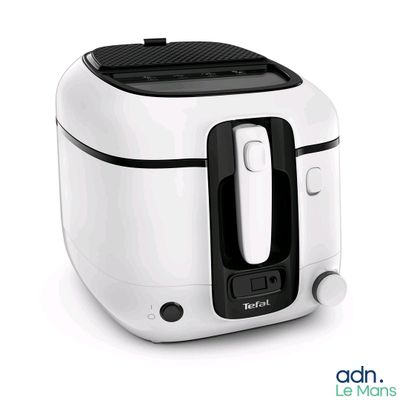 a white and black air fryer sitting on a white surface