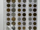 a lot of different coins in a plastic case
