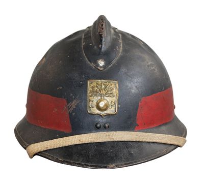 an old fireman ' s helmet on a white background with a red stripe