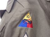 a military uniform with a patch on the chest