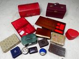 many different types of boxes and cases on the floor