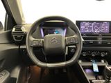 the interior of a car with a steering wheel, dashboard, and dash board