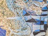 a close up of a mosaic of a person on a horse