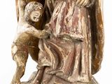 an image of a statue of a woman holding a child and a dog