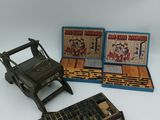 three different types of toys including an old typewriter, a keyboard and a mouse